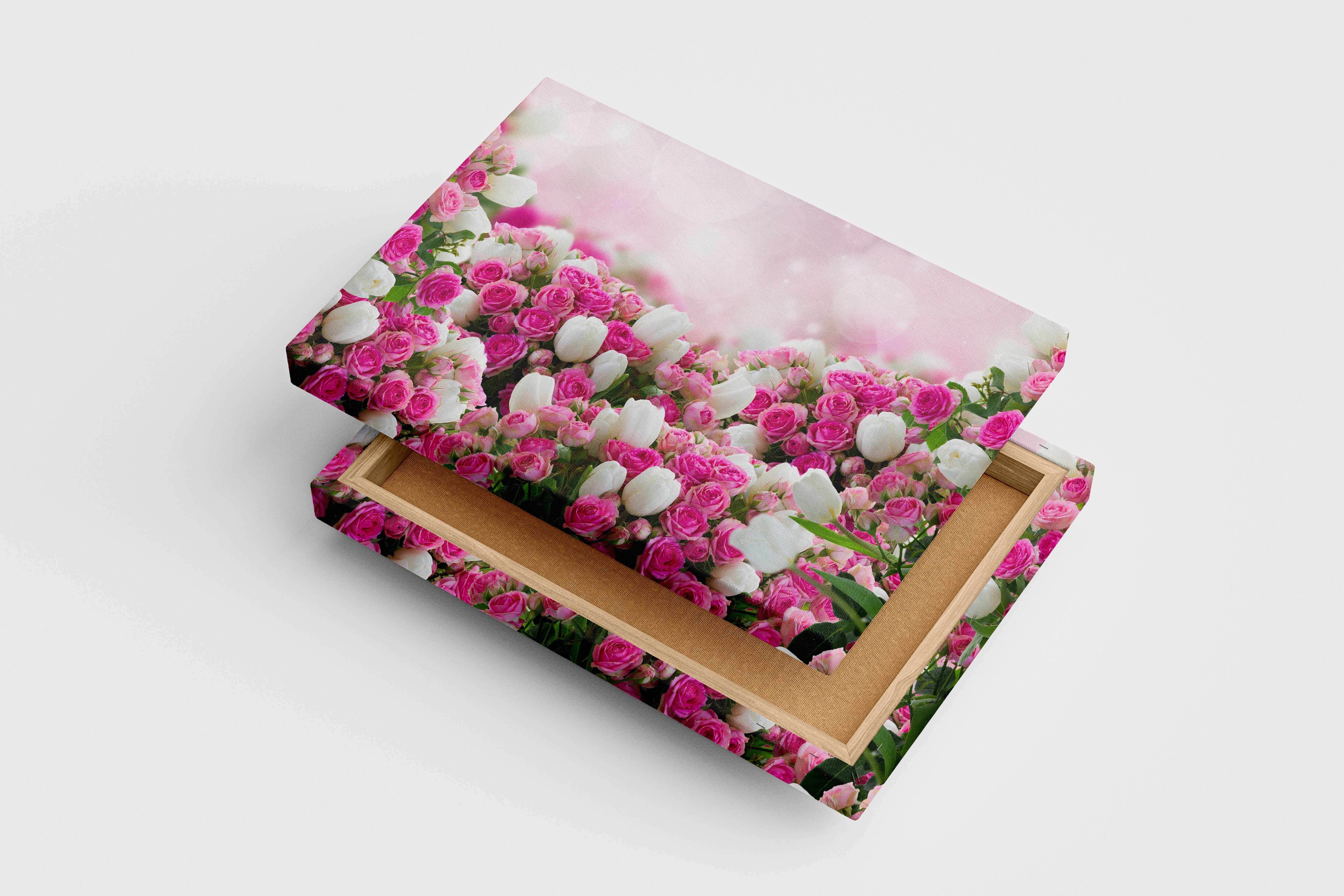 a lush bed of pink roses and white tulips on a sparkling bokeh background, flower motif, art, kanvas tablo
