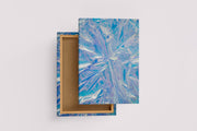 a close-up of a crumpled, futuristic holographic material with iridescent blue and purple reflections, abstract, art, kanvas tablo