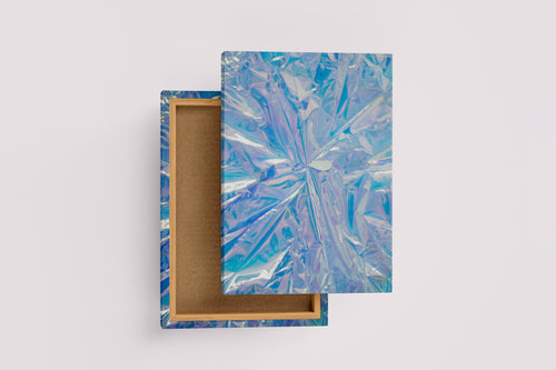 a close-up of a crumpled, futuristic holographic material with iridescent blue and purple reflections, abstract, art, kanvas tablo