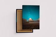 a man on a beach at night, illuminating a sea stack under the milky way, art, kanvas tablo