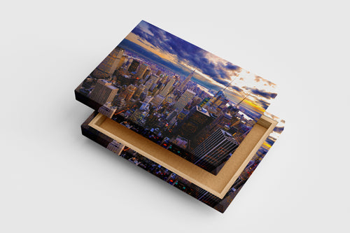 new york city at sunset, with dramatic sunbeams breaking through dark clouds, view, art, kanvas tablo
