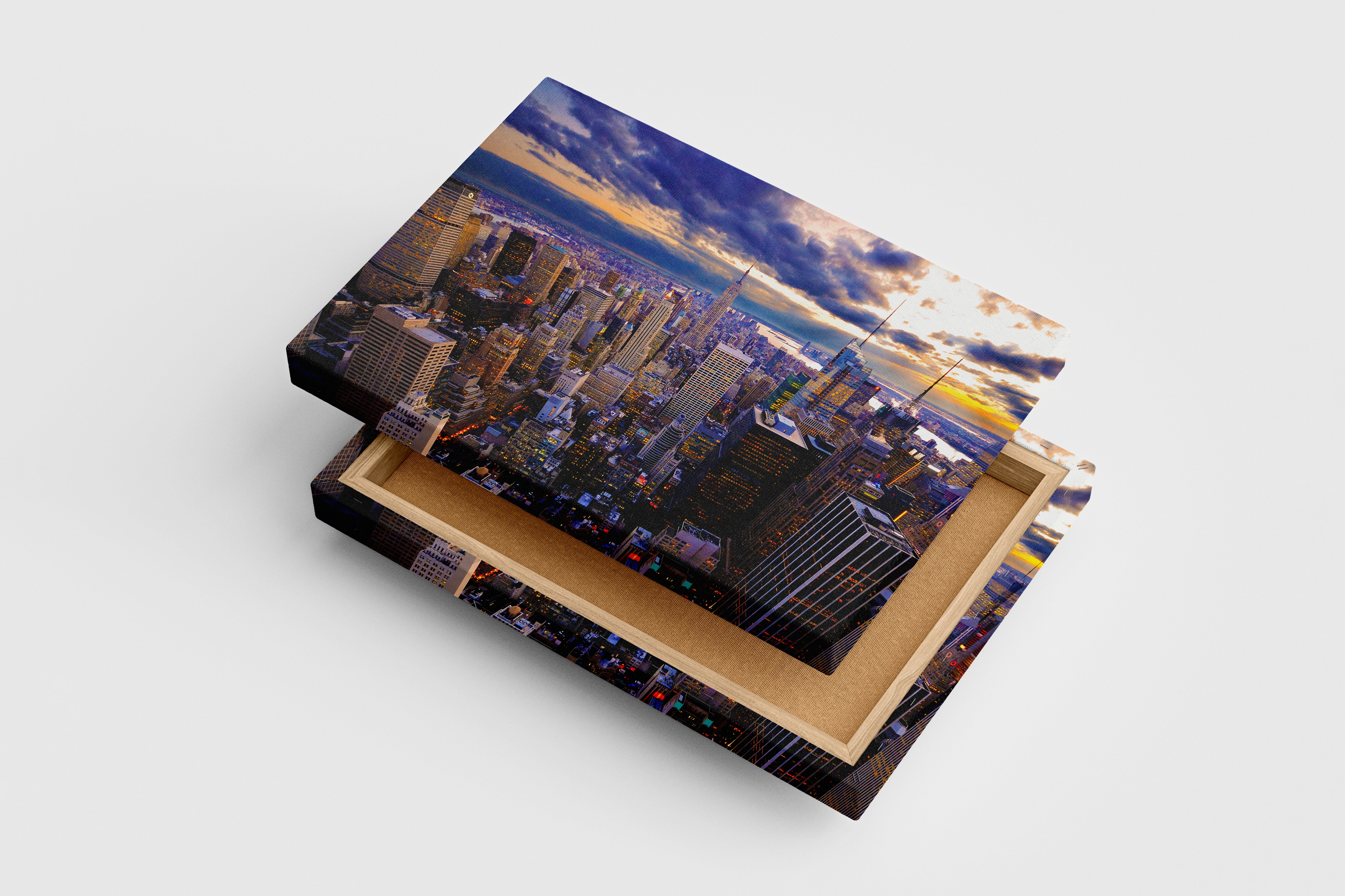 new york city at sunset, with dramatic sunbeams breaking through dark clouds, view, art, kanvas tablo