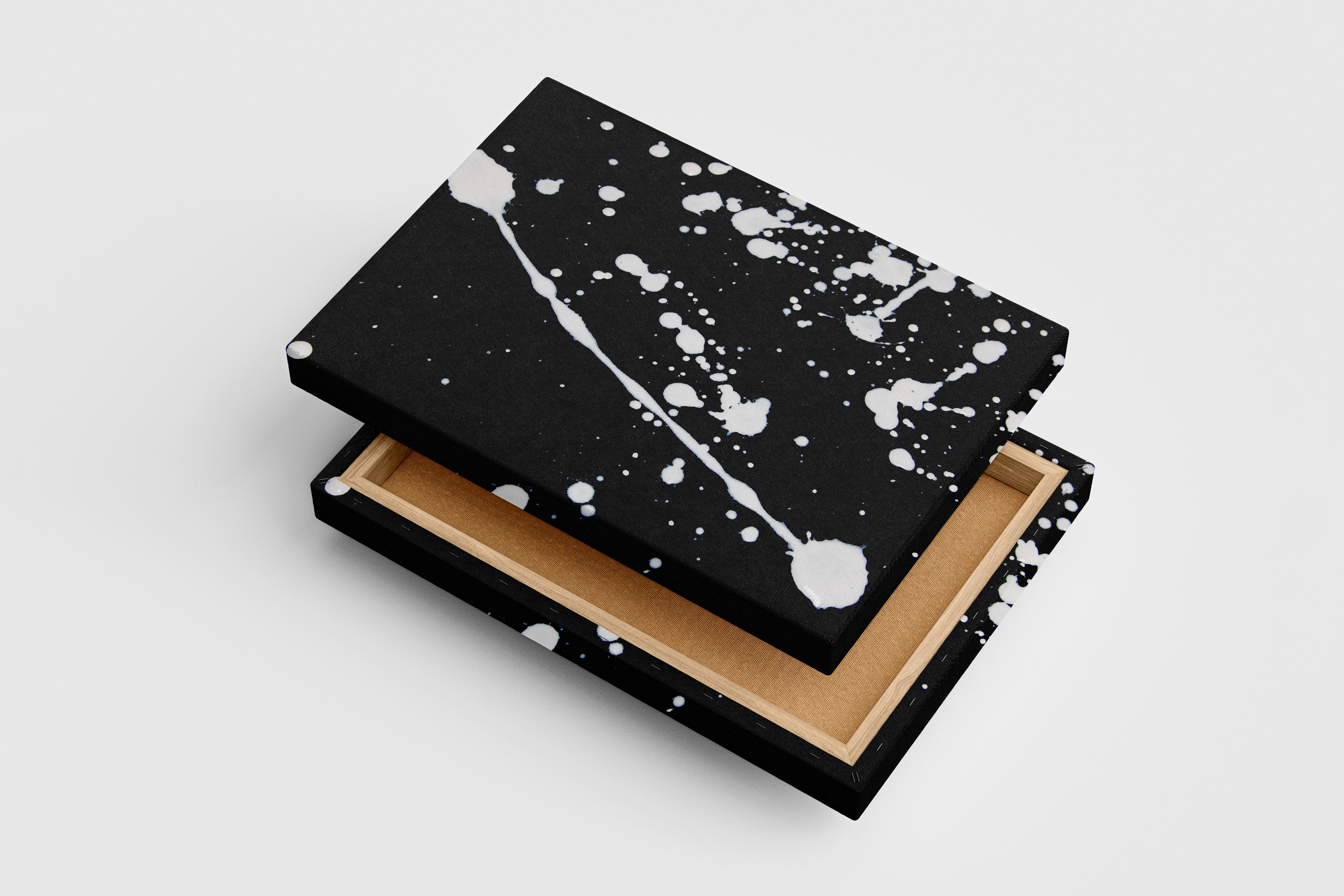 a minimalist abstract artwork with dynamic white paint splatters on a black background, abstract, art, kanvas tablo