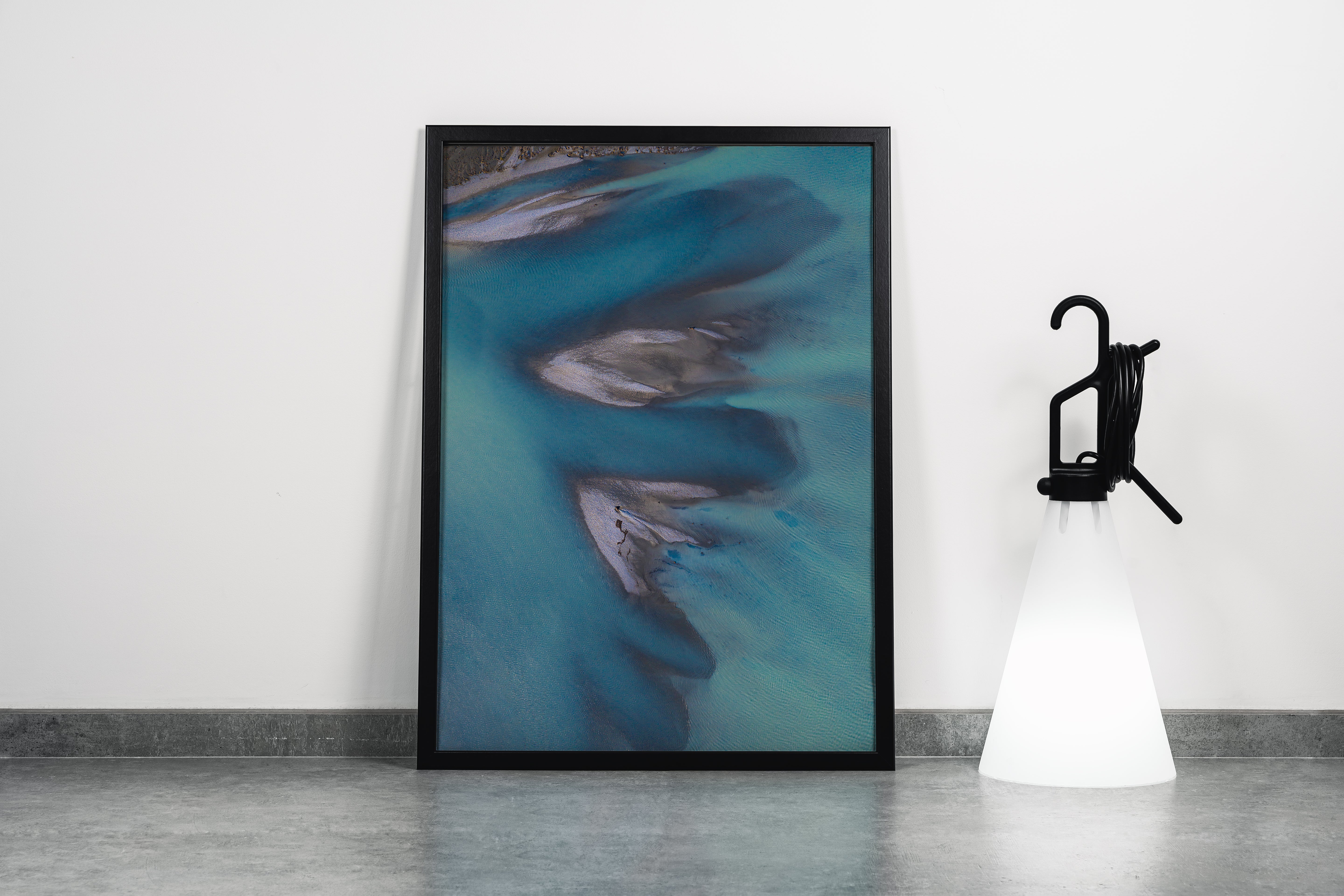 a minimalist aerial photograph of sandbars creating abstract shapes in calm, blue-grey water, abstract, art, kanvas tablo