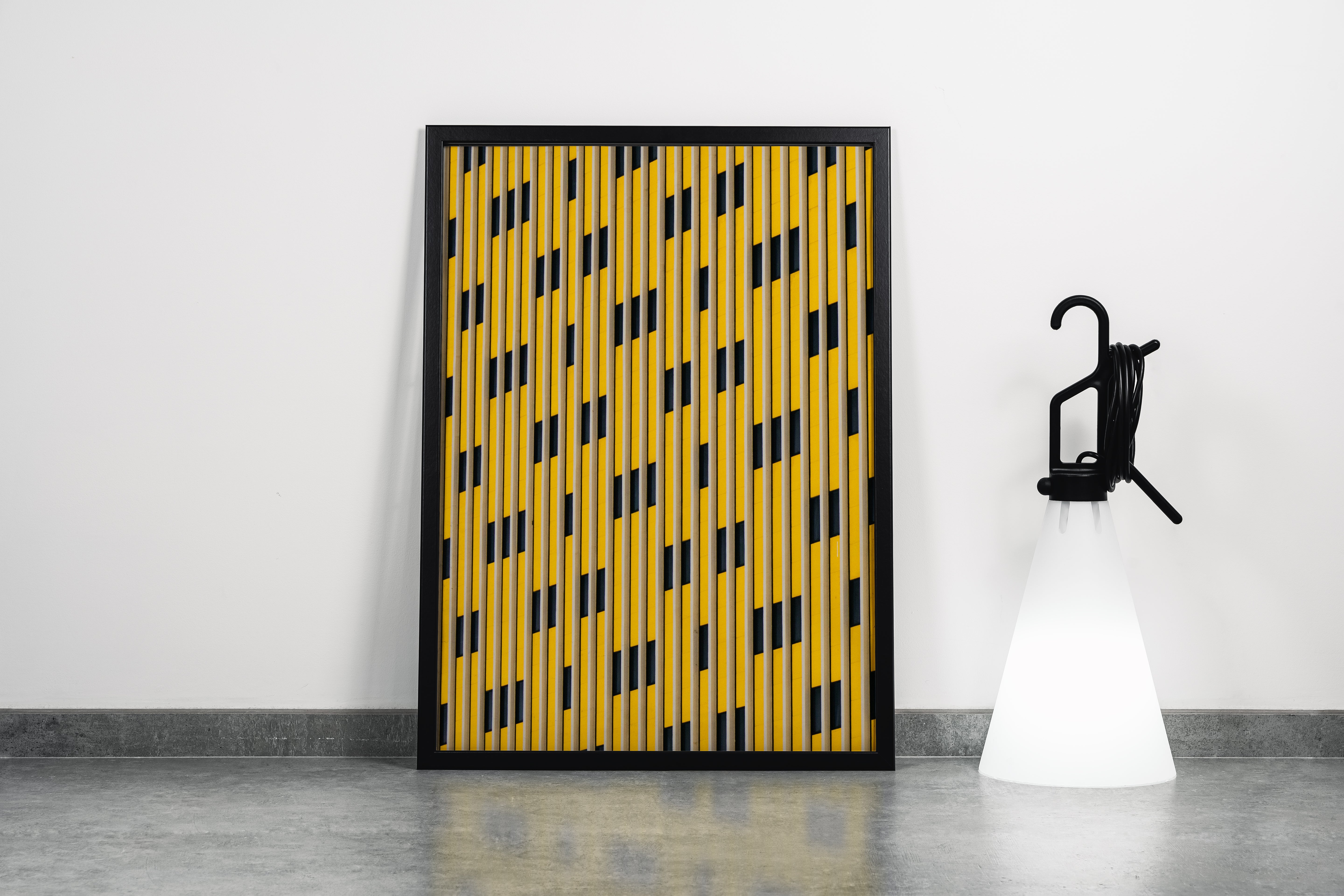 a striking architectural pattern of yellow and black vertical lines creating a rhythmic facade, abstract, art, kanvas tablo