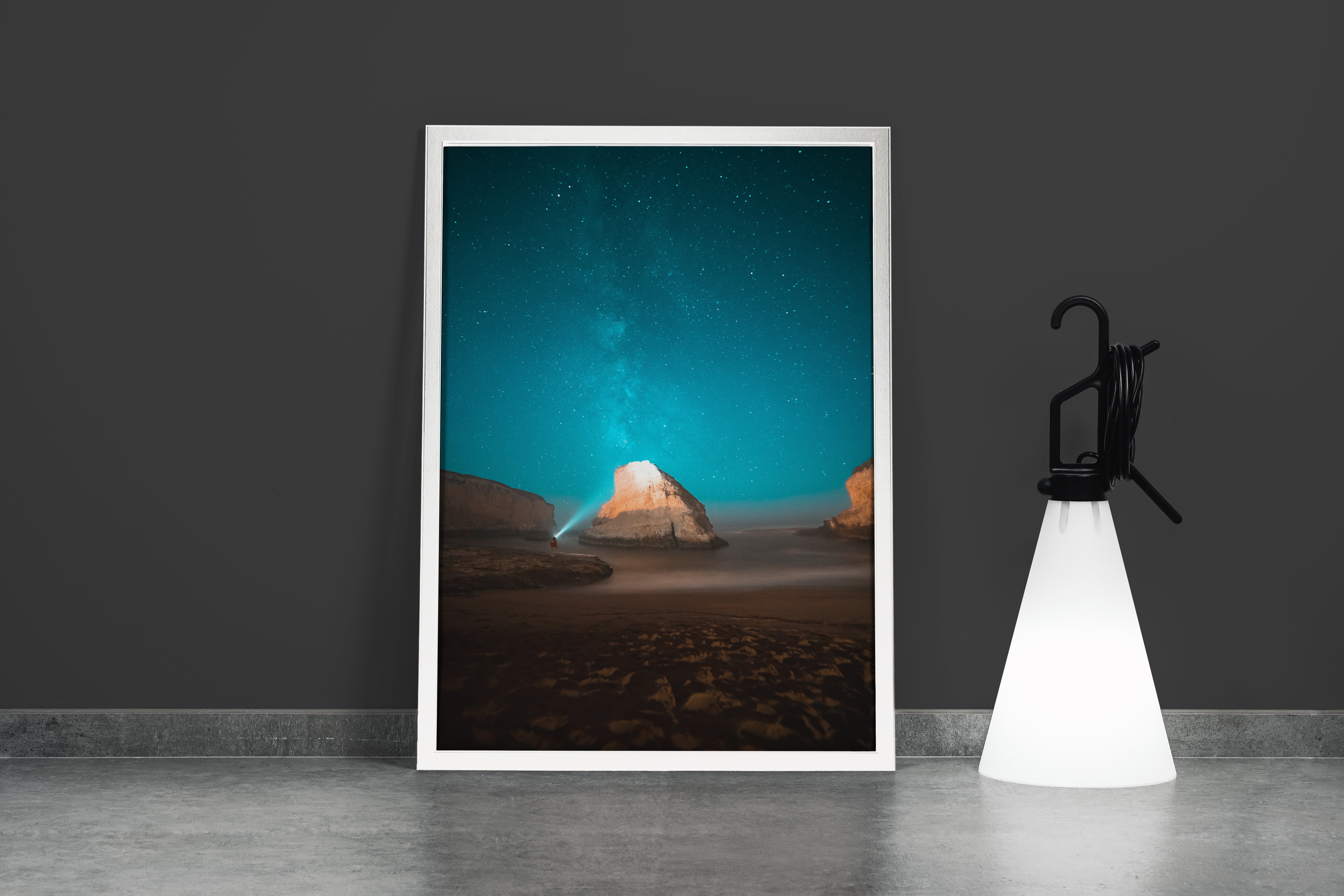 a man on a beach at night, illuminating a sea stack under the milky way, art, kanvas tablo
