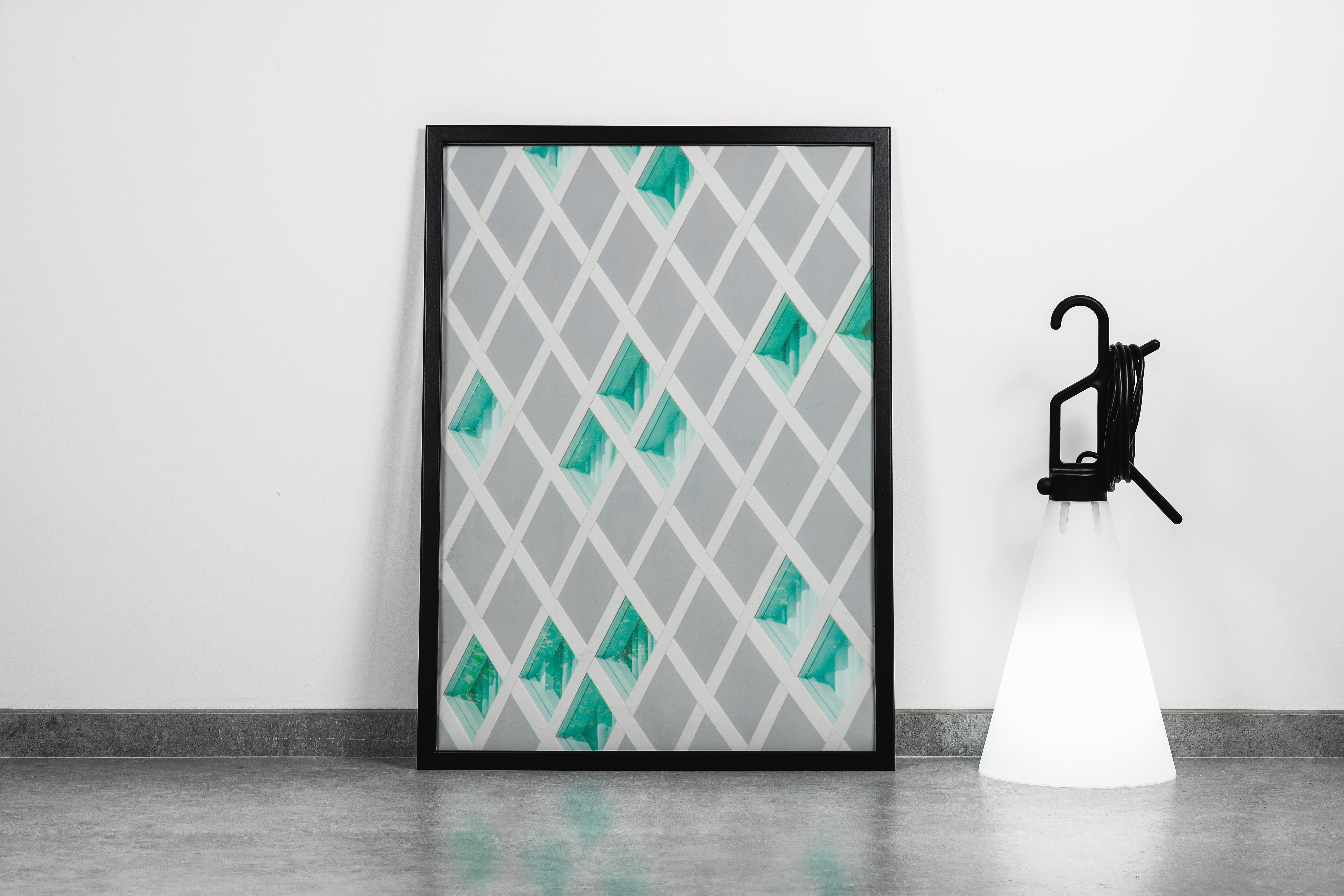 a minimalist architectural facade with a white diagonal lattice over turquoise glass windows, abstract, art, kanvas tablo