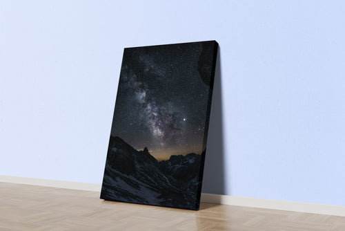a stunning photograph of the milky way galaxy over a dark, snowy mountain range, abstract, art, kanvas tablo