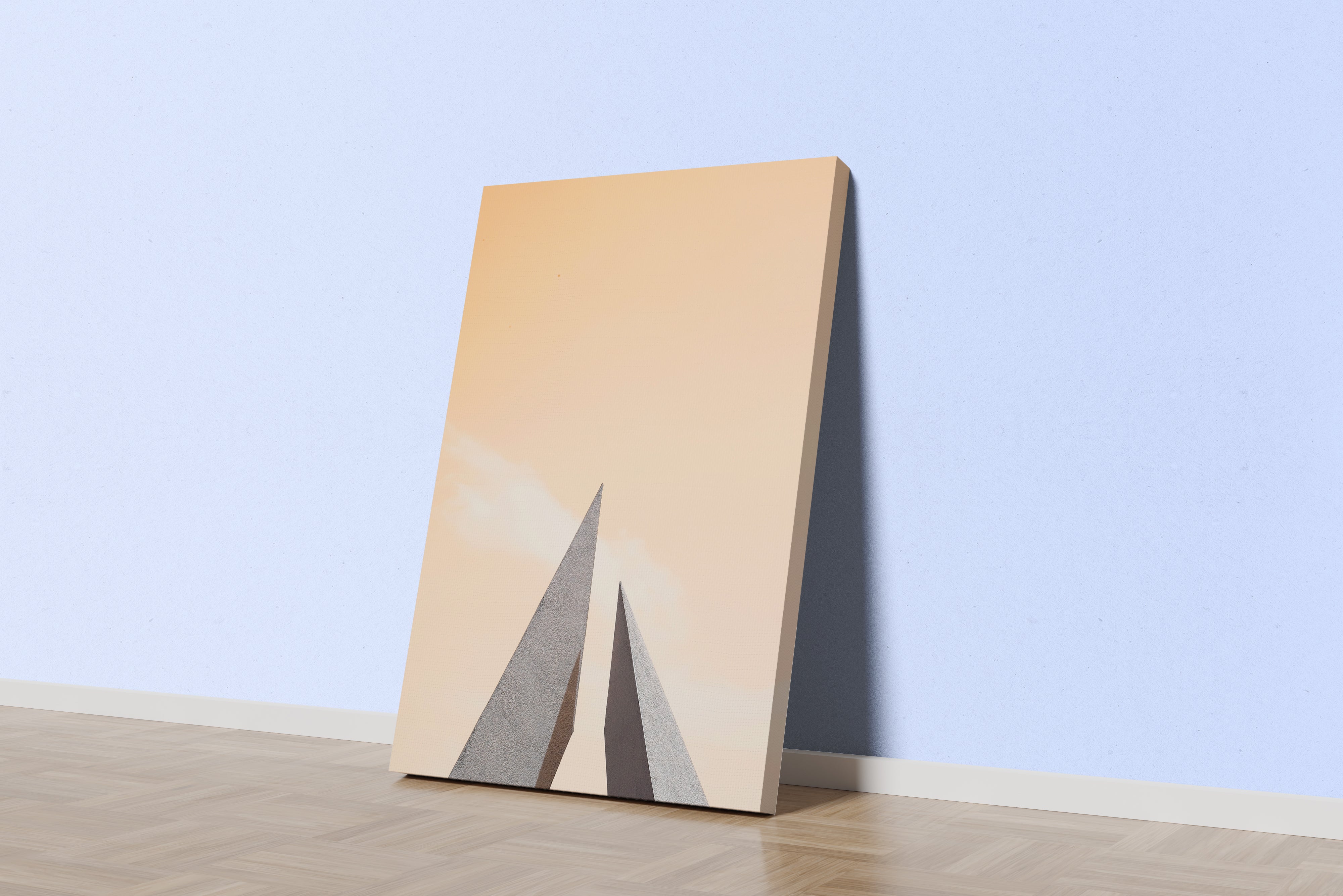 minimalist architectural photo of two sharp triangular structures against a warm pastel sky, abstract, art, kanvas tablo