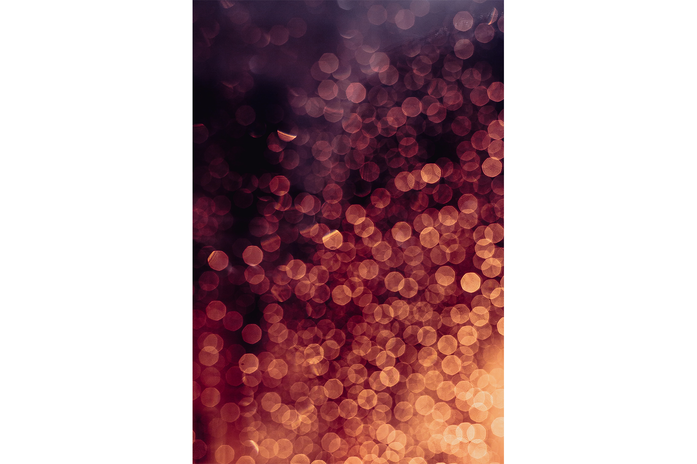 an abstract photograph of warm, golden and red bokeh lights on a dark background, abstract, art, kanvas tablo