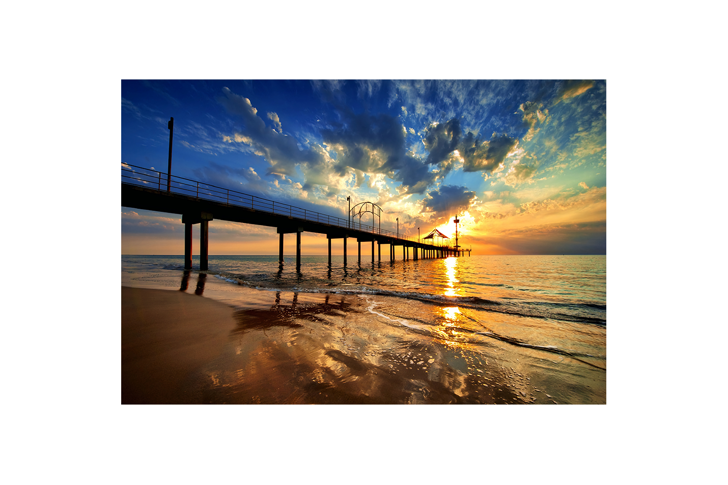 a pier on a beach under a dramatic sunset with golden reflections, view, art, kanvas tablo