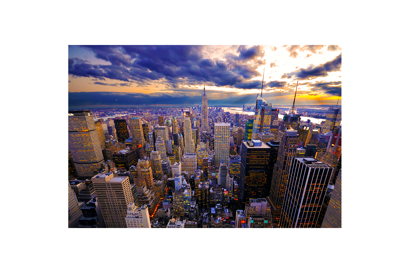 new york city at sunset, with dramatic sunbeams breaking through dark clouds, view, art, kanvas tablo