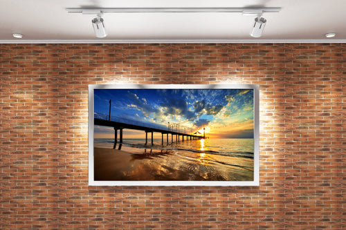 a pier on a beach under a dramatic sunset with golden reflections, view, art, kanvas tablo