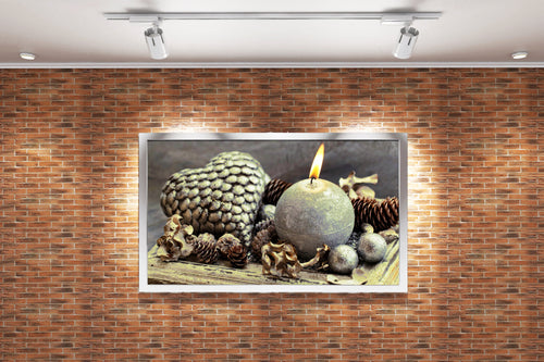 a cozy, rustic winter display with a lit candle, pinecones, and a heart, art, kanvas tablo