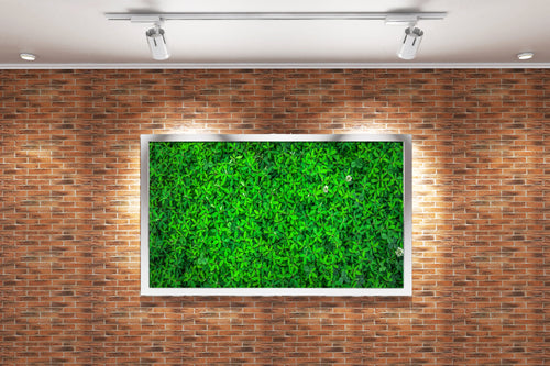 a top-down view of a dense carpet of vibrant green leaves and flowers, view, art, kanvas tablo