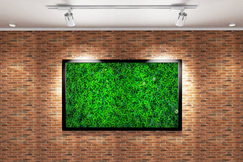 a top-down view of a dense carpet of vibrant green leaves and flowers, view, art, kanvas tablo