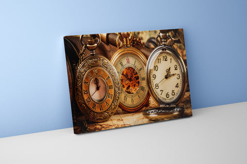 a still life of ornate, vintage pocket watches on an old world map, art, kanvas tablo