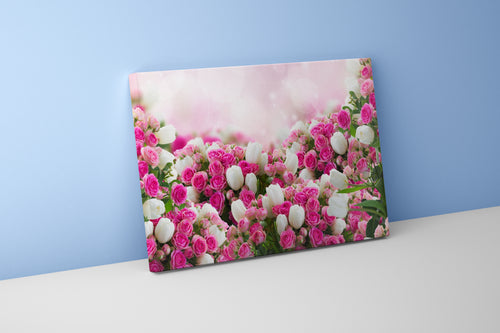 a lush bed of pink roses and white tulips on a sparkling bokeh background, flower motif, art, kanvas tablo