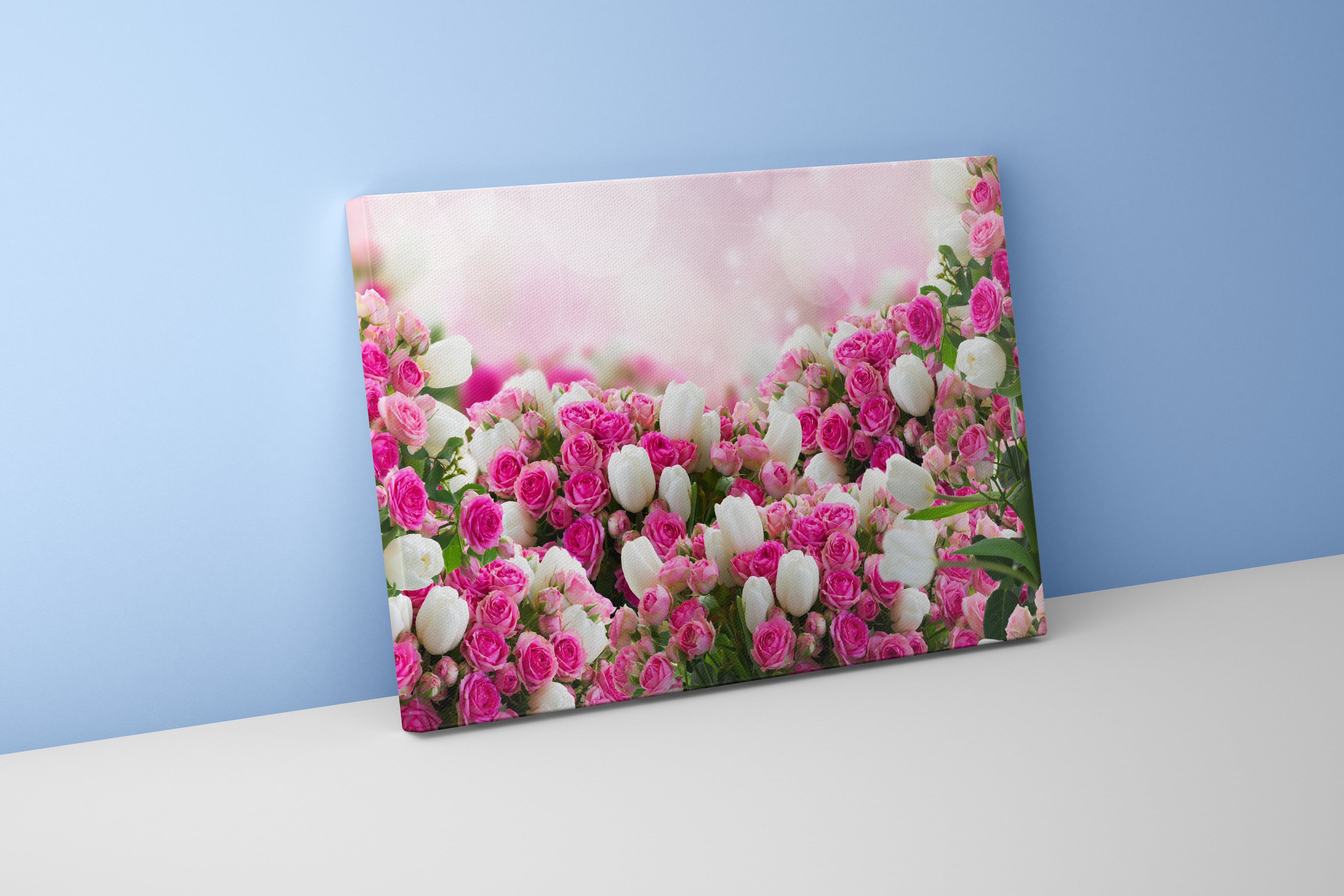 a lush bed of pink roses and white tulips on a sparkling bokeh background, flower motif, art, kanvas tablo