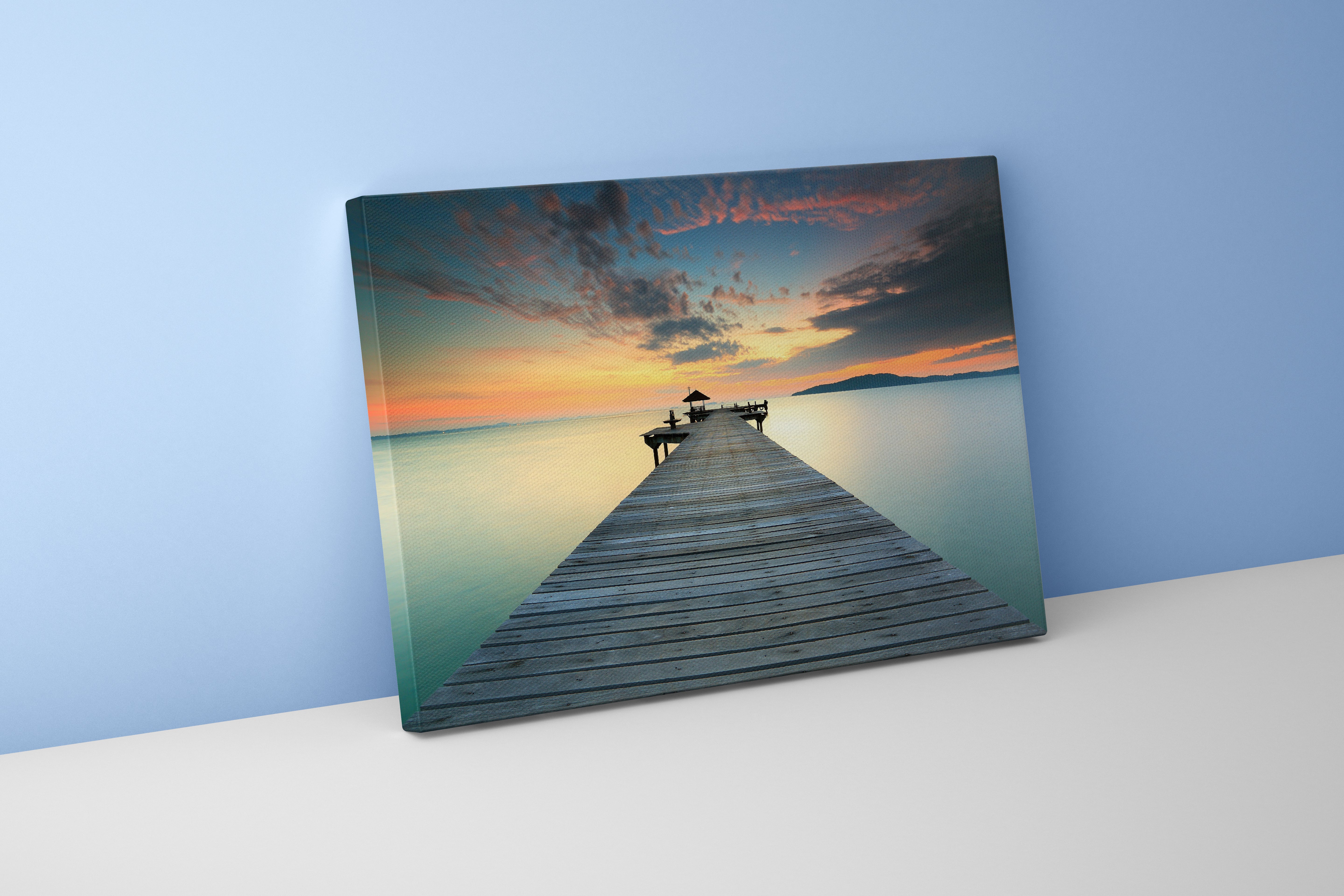 a serene long exposure of a wooden pier over a glassy sea at sunset, view, art, kanvas tablo