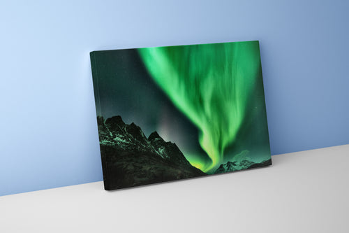 a vibrant green aurora dancing over jagged, snow-dusted mountain peaks, view, art, kanvas tablo