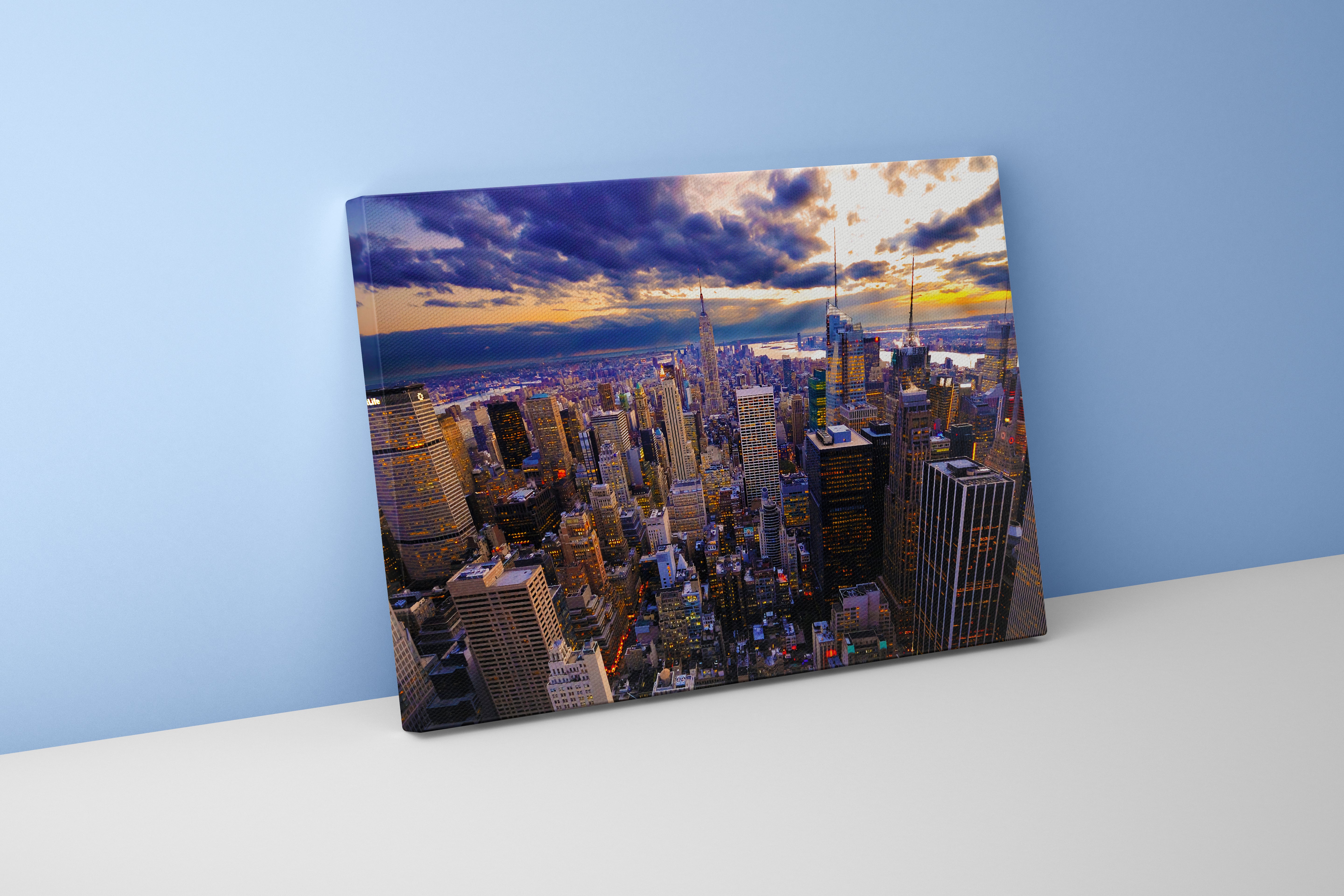 new york city at sunset, with dramatic sunbeams breaking through dark clouds, view, art, kanvas tablo